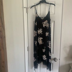 Black spaghetti strap dress with with lily print